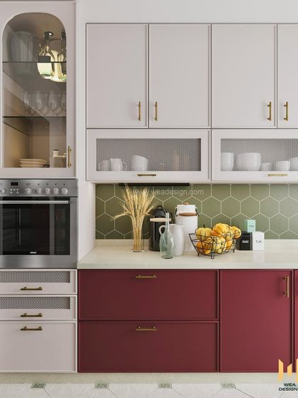 A view of the built-in oven and crockery unit in the magenta kitchen, showing how we integrate appliances seamlessly into a colorful and stylish design.