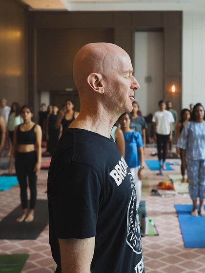 A moment of quiet instruction and focused listening. Eddie's presence and deep knowledge created a serene and powerful atmosphere for learning.
