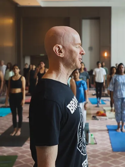 A moment of quiet instruction and focused listening. Eddie's presence and deep knowledge created a serene and powerful atmosphere for learning.