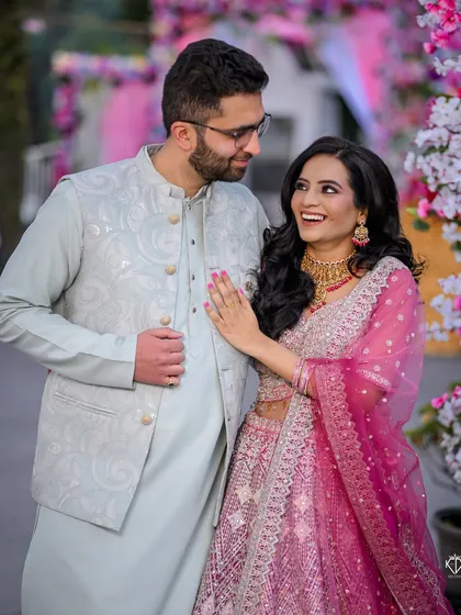A moment of shared laughter and joy, perfectly capturing the celebratory mood of the engagement.