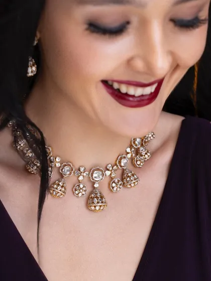 A candid, smiling moment from a jewellery shoot. Even in high-fashion, I love capturing moments of genuine joy. The styling here is classic and elegant, with a beautiful necklace that complements the model's smile.
