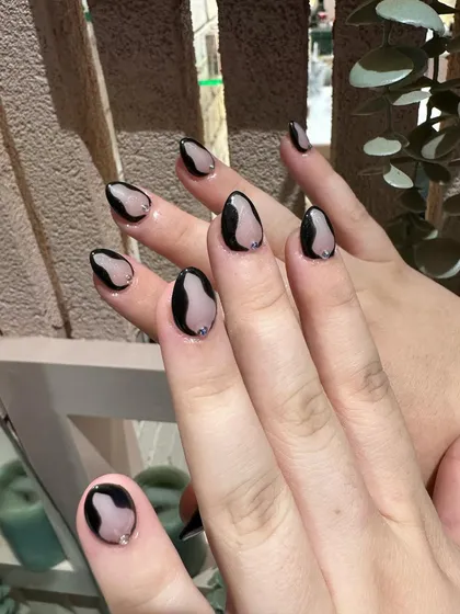 Another look at the bold, graphic shapes of this hand-painted set. It's a chic and edgy choice.