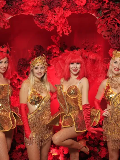 We bring the energy and entertainment to match your theme. For this bold and luxurious red and gold Sangeet, we coordinated with professional dancers in stunning costumes to welcome guests and kick off a high-energy celebration.