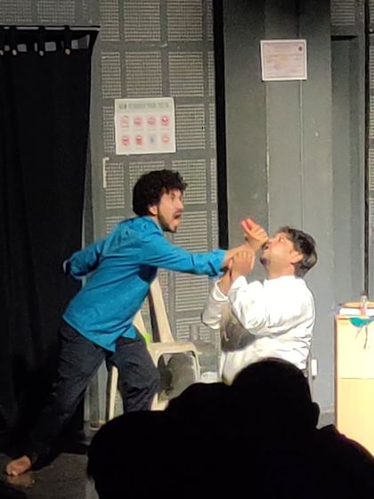 A dynamic scene from 'The Good Doctor' production. The actors' physicality and commitment to the moment are on full display.