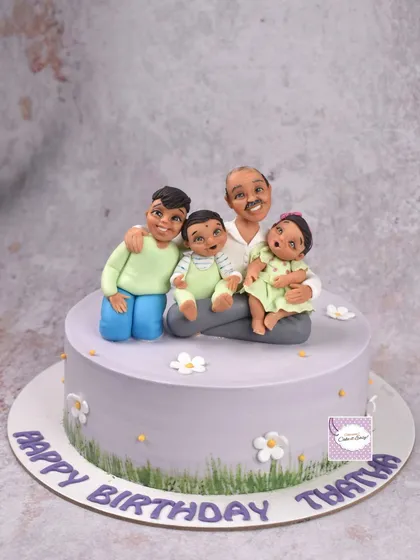 This cake was for a grandfather's birthday, featuring him with all his grandkids. Creating personalized figurines that capture the likeness and love of a family is one of the most special parts of my job. These are the cakes that become the centerpiece of a celebration.