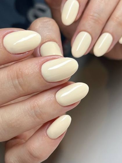 A creamy, pale yellow manicure. This soft, buttery shade is a subtle and stylish way to wear a pop of color.