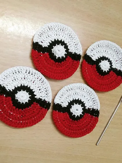 Gotta catch 'em all! These are our fun, handmade Pokeball coasters, perfect for adding a touch of geeky charm to your desk or living room. A great gift for any Pokemon fan.