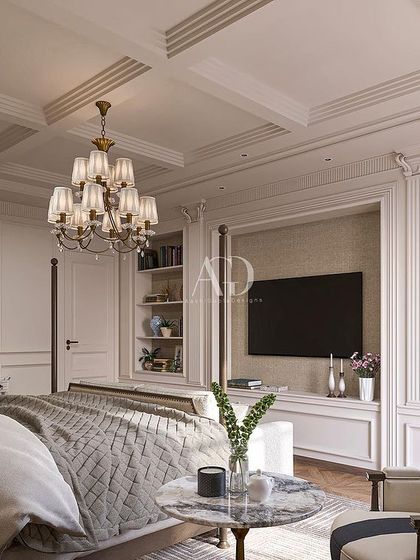 The classic four-poster bed is given a modern interpretation in this design. The room also features built-in shelving for a television and decor, seamlessly blending modern needs with timeless style.