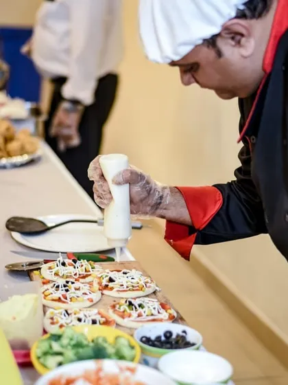 See the magic happen with my live pizza counter. Kids are fascinated as my chef prepares fresh, cheesy mini pizzas right before their eyes. It's not just food, it's entertainment.