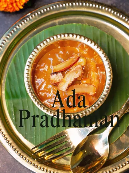 My Ada Pradhaman, a labour of love. Beaten rice flakes are slow-cooked in dark jaggery and coconut milk, finished with fried coconut bits for a signature umami twist. It's tradition in a bowl.