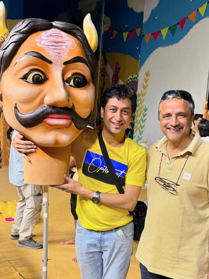 Holding one of the large heads from the Ravan puppet, standing next to Satyajit Bhatkal, the CEO of Paani Foundation. The intricate details of each piece were crucial to the overall storytelling.