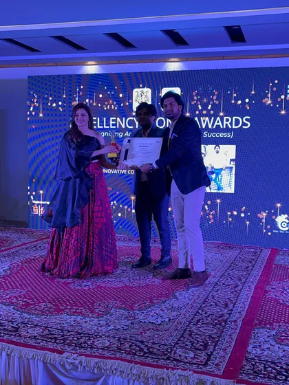 Receiving the award certificate on stage. This recognition from the industry is an honor and reflects our commitment to quality and client satisfaction in every turnkey project.