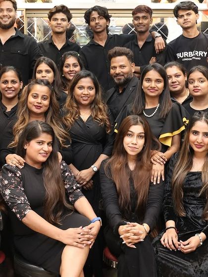 A close-up of some of the smiling faces behind the incredible work we do at the salon.