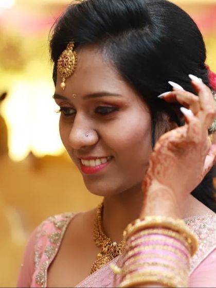 A happy, candid moment from the engagement. This close-up shows her glowing skin, the subtle shimmer on her eyes, and a smile that shows how confident she feels.