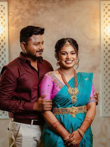 A beautiful portrait of my bride Sugirtha and her groom at their engagement in Karur. Her makeup is fresh and glowing, with a focus on enhancing her natural features.