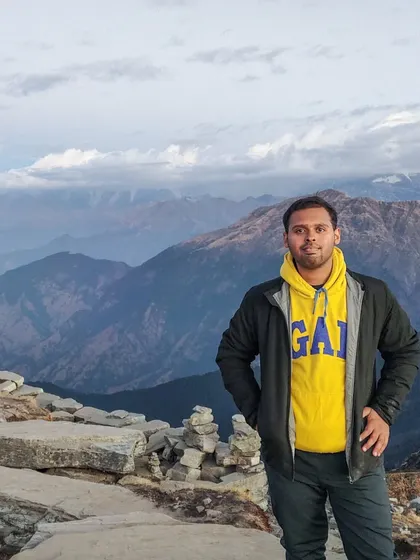 A solo moment of peace at Chandrashila peak. The mountains have a way of whispering stories of courage, and the sunrise here truly kisses your soul.