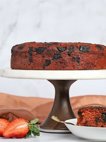 A full view of my Strawberry Dark Chocolate Cake. It’s made without butter, maida, or sugar, so you can enjoy its goodness guilt-free.