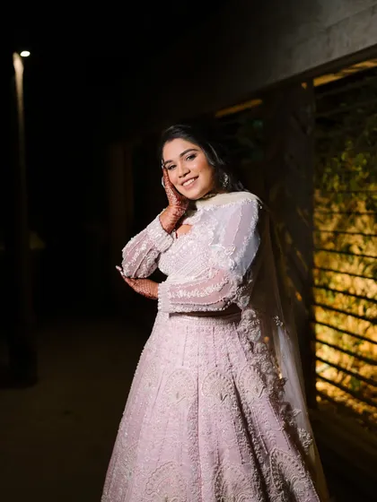 A happy and confident portrait of the bride-to-be. Her smile and glowing makeup light up the frame.