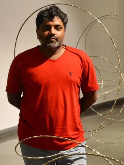 A birthday wish for artist Aishwaryan K, pictured here with one of his sculptural installations.