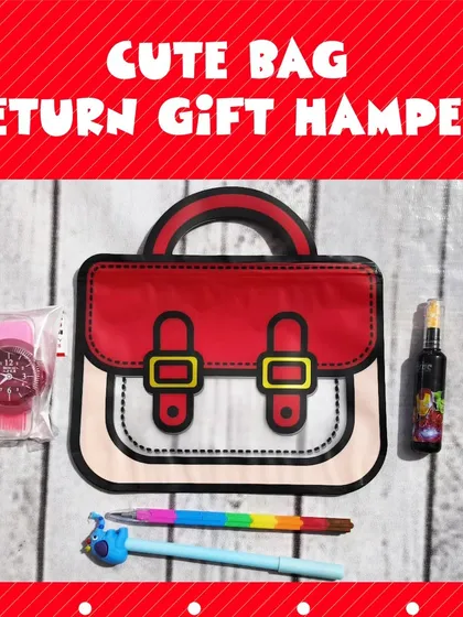 This flat lay shows the contents of the cute bag hamper: a watch, a pen, and other stationery, all fitting neatly inside the bag.