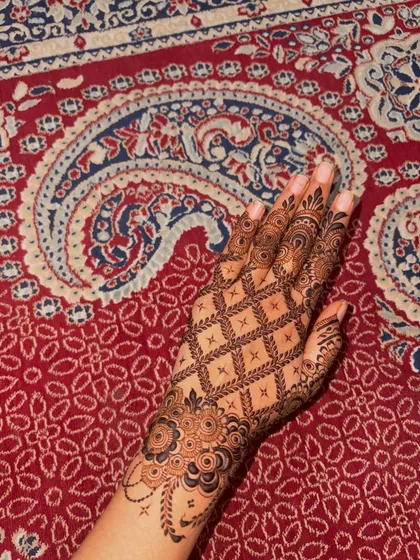 The design looks so beautiful against this traditional patterned rug.