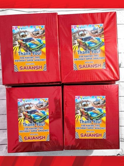 For a Supercars-themed party, the stationery sets were wrapped in red foil paper with a custom thank you sticker.