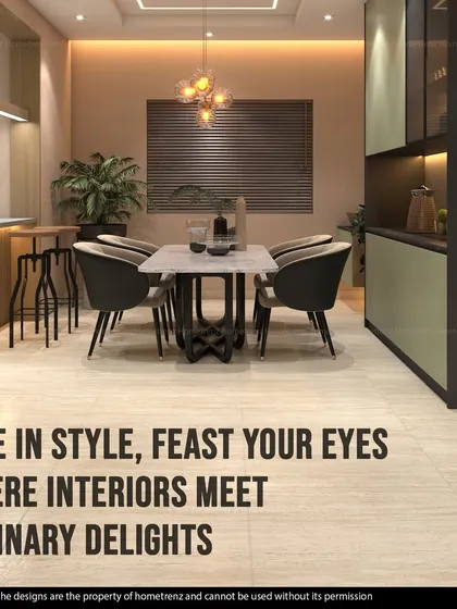 Dine in style and feast your eyes. This dining space is designed to be a place where culinary delights meet beautiful interiors, with a modern table setup and a stylish bar area.