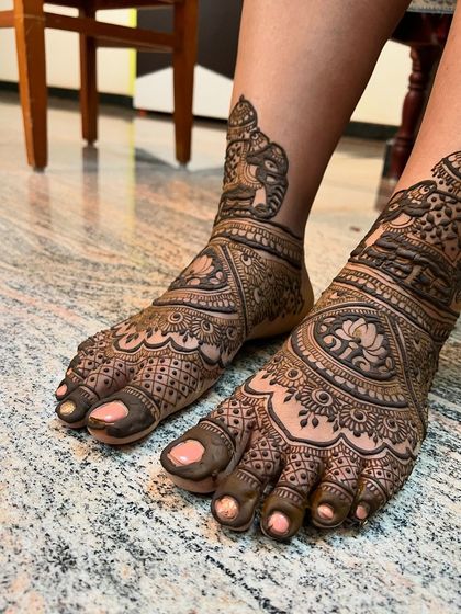 A side view of the elephant foot design, showing how the pattern wraps around the ankle.