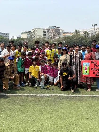 Our constant support system. A group photo with our amazing parents, who are the best supporters a team could ask for.