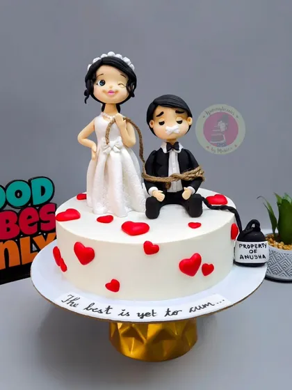Another look at our popular bridal shower cake design. The tiny "Property of" sign adds a humorous touch that clients love.