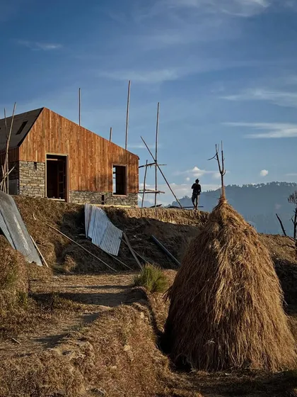 A lone haystack stands sentinel near one of our guesthouses in the Himalayas. This image captures the agrarian context of our work, where we strive to build in harmony with the existing landscape and local ways of life.