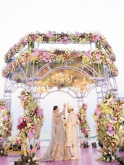 There's nothing more romantic than a beach wedding. This stunning floral mandap set against the serene ocean backdrop is perfect for couples who want their 'I do' moment to feel both grand and intimate.