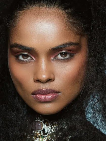 A student from our Mumbai academy created this stunning look, featuring voluminous natural hair and sculpted glam, elevated with statement jewels.