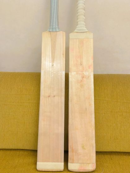 A look at the front face of two new cricket bats. A good bat should have clean grains, good balance, and a great 'ping' off the face.