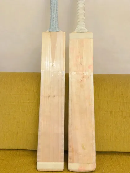 A look at the front face of two new cricket bats. A good bat should have clean grains, good balance, and a great 'ping' off the face.