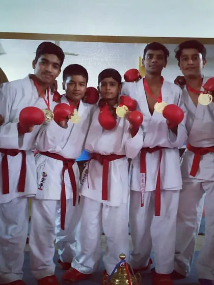 Teamwork makes the dream work. Our sub-junior team proudly displays their gold medals after winning the team Kumite event. This shows the strength and coordination we build in our fighters.