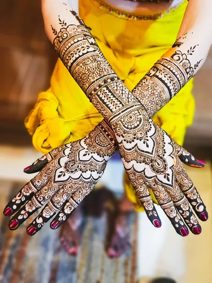 Classic bridal henna with bold, clear lines and a beautiful contrast between the filled and open spaces.