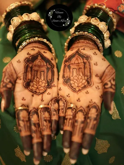 This design features architectural 'jharokha' or balcony motifs, giving it a royal, palatial feel. It's a unique and stunning choice for a bride or festive celebration.