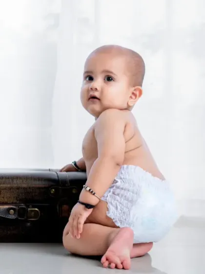The tiniest feet make the biggest footprints in our hearts. A classic baby portrait.