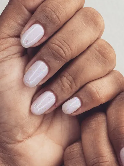 An opal creation. This glittery polish has a beautiful iridescent shine that looks like crushed opals.