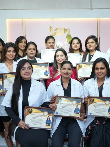 A group photo with my Salon Cosmetology Diploma graduates. They are all now certified and ready to make their mark in the beauty world.