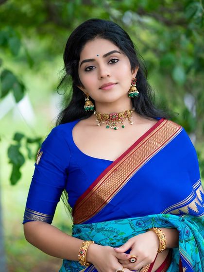 A classic portrait of Megha Shetty, where her direct gaze connects with the viewer, making it a powerful image for her portfolio.