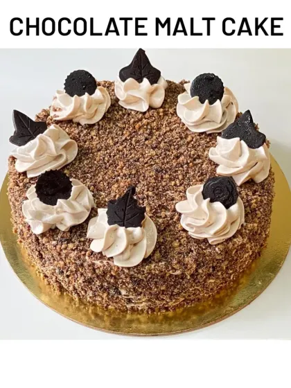 My signature Chocolate Malt Cake. This cake has a nostalgic, malty flavor that pairs perfectly with the rich chocolate, a true comfort dessert.