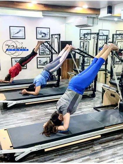 Our group classes are all about synchronized, powerful movements. This advanced inverted exercise on the Reformer builds exceptional core strength, control, and body awareness.