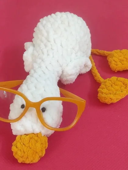 This is LIMO, my lazy day duck friend. With his quirky glasses and fluffy body, he’s the perfect companion for a relaxing day in bed.