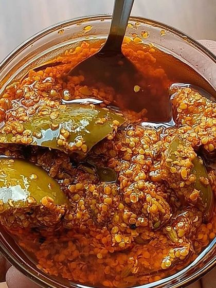 A close-up view of my homemade mango pickle. You can see the rich texture of the masala and the soft mango pieces. It is a taste of tradition in every bite.