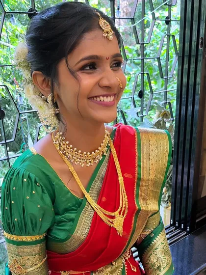 Happy brides are the prettiest. It was a joy to create this classic Maharashtrian bridal look for Aditi, complete with a traditional nath and puff-sleeved blouse.
