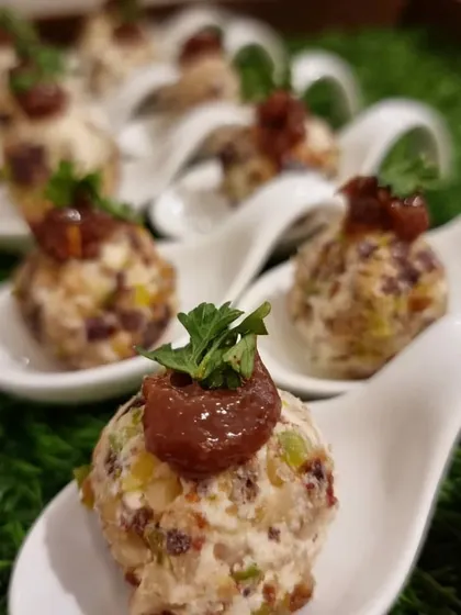 Cranberry and Nut Chèvre Mascarpone Tuscan Truffles. These delightful cheese bites are dotted with fig jam, offering a perfect balance of creamy, sweet, and nutty flavours.