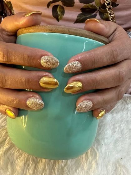Gold glitter and chrome foil nails are perfect for a wedding or party. I kept these nails short and practical for the client, a baker, without sacrificing any of the glam.