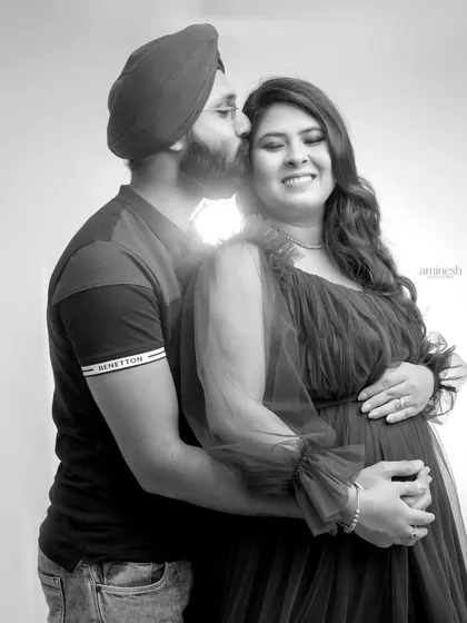 A tender black and white portrait showing the partner's affection. These close-up shots are perfect for capturing the subtle emotions and intimate connection you share.